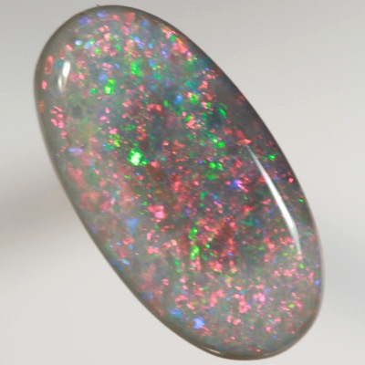 SOLID SEMI BLACK OPAL Bright, sparkly red and green